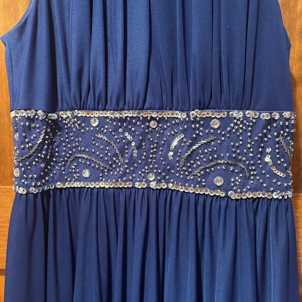 J S Collection blue sapphire cocktail dress with metallic beading under empire.